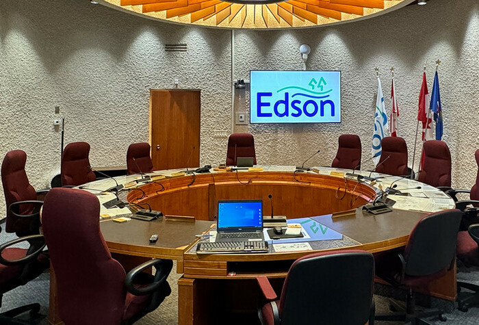 Edson Town Council Chambers. Chairs around a round table.